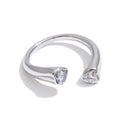 Cubic zirconia heart ring in 18K gold-plated stainless steel with cubic zirconia.