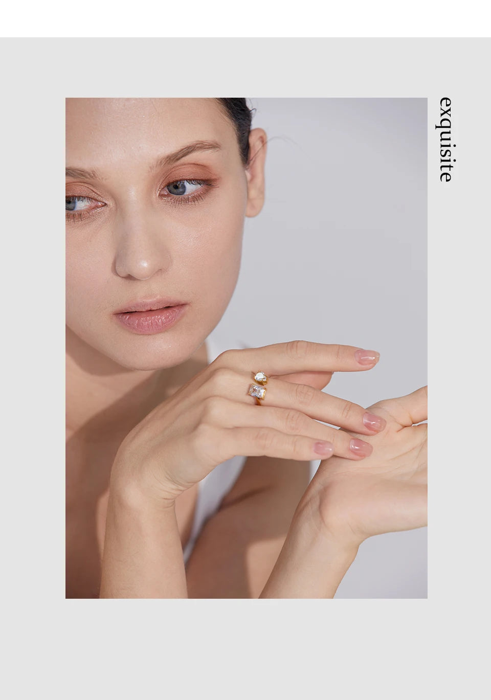 White cubic zirconia geometric ring in 18K gold-plated stainless steel with cubic zirconia.