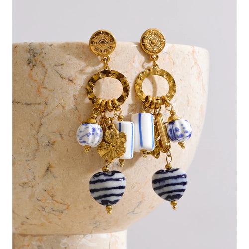 Blue heart flower earrings in gold-plated stainless steel.