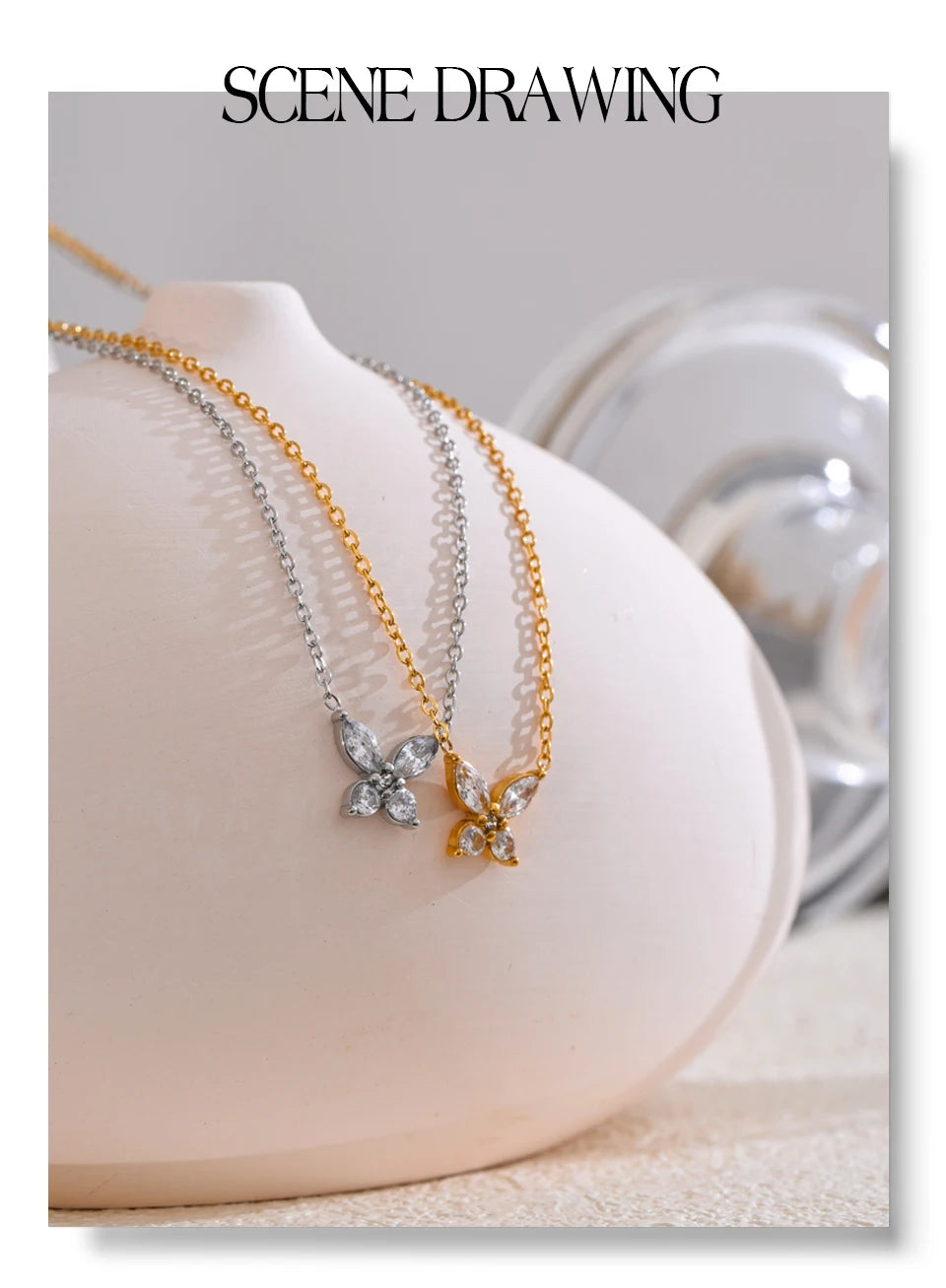 Cubic zirconia butterfly necklace in gold-plated stainless steel with cubic zirconia.