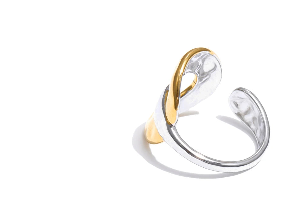 Geometric ring in 18K gold-plated stainless steel.