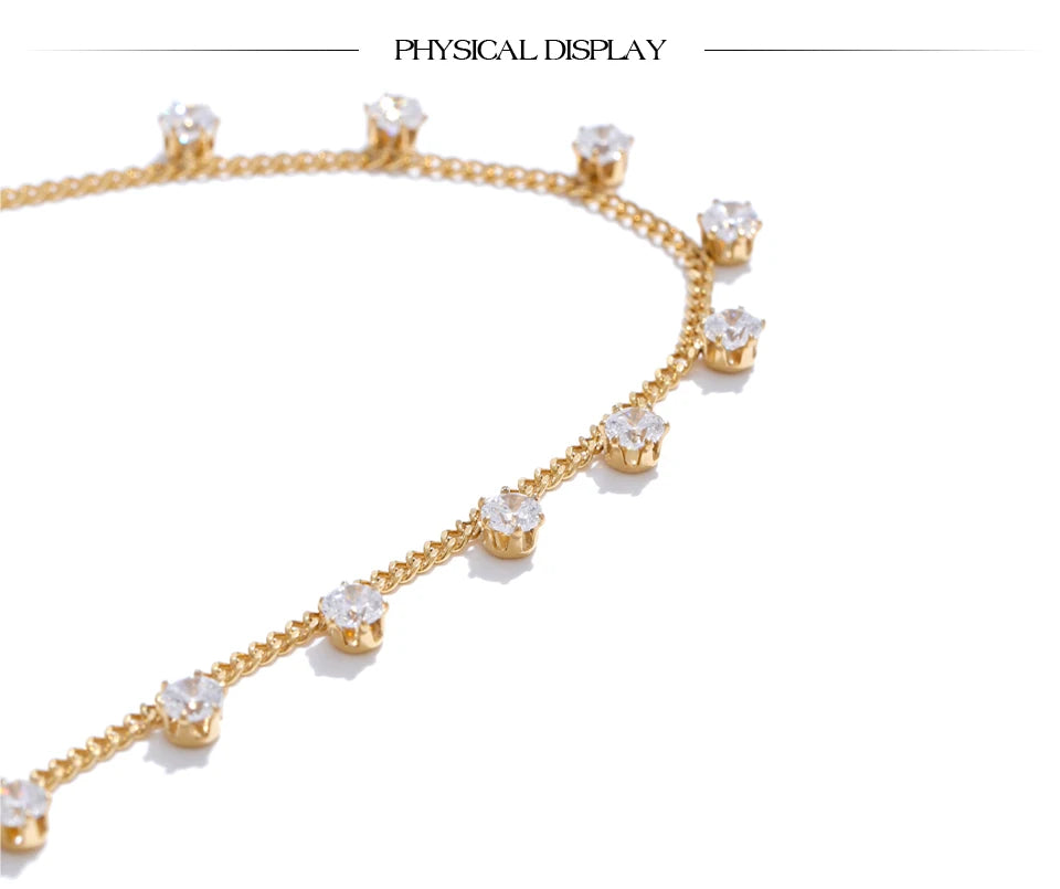 Cubic zirconia geometric chain necklace in gold-plated stainless steel with cubic zirconia.