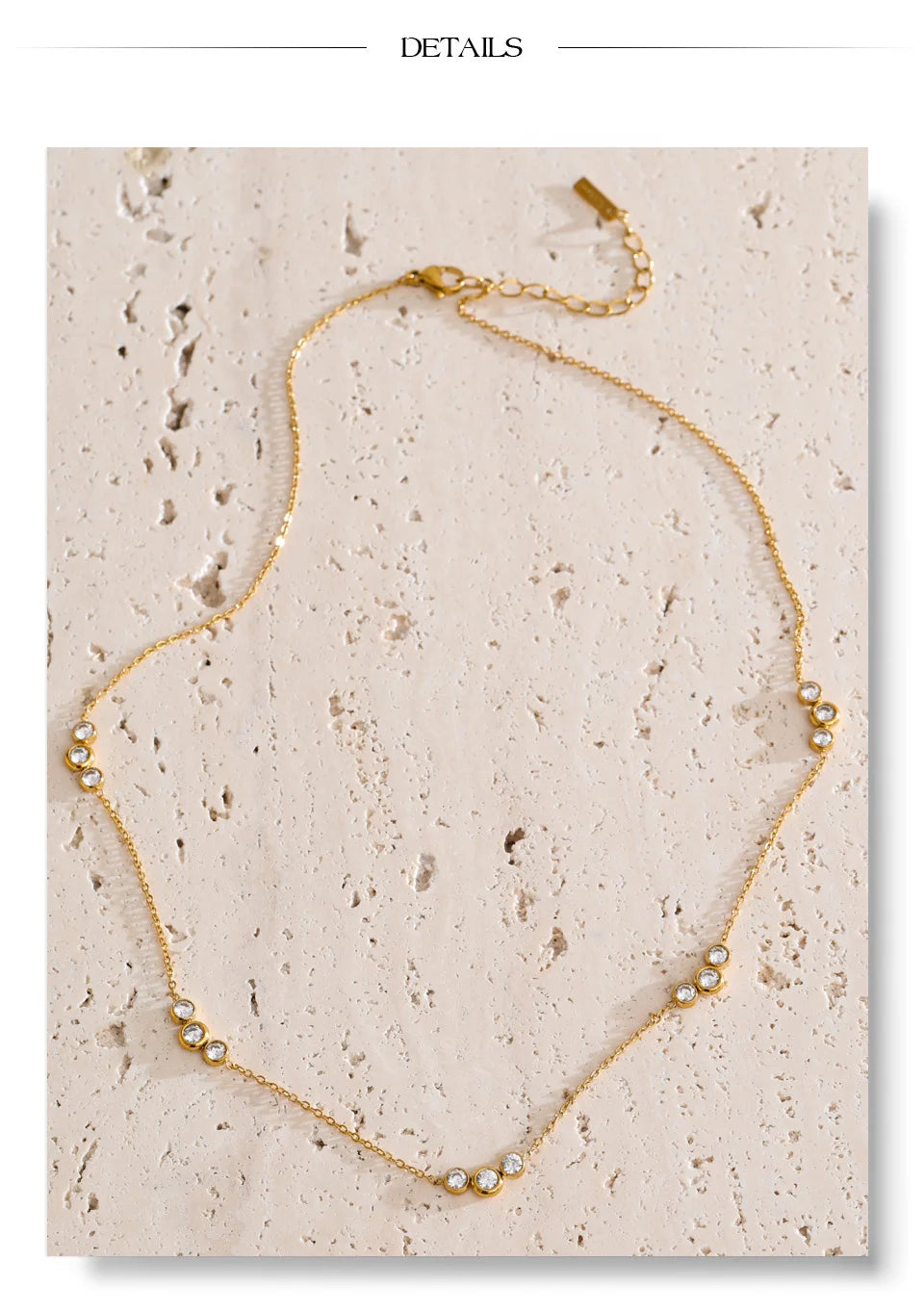 Cubic zirconia geometric chain necklace in gold-plated stainless steel with cubic zirconia.