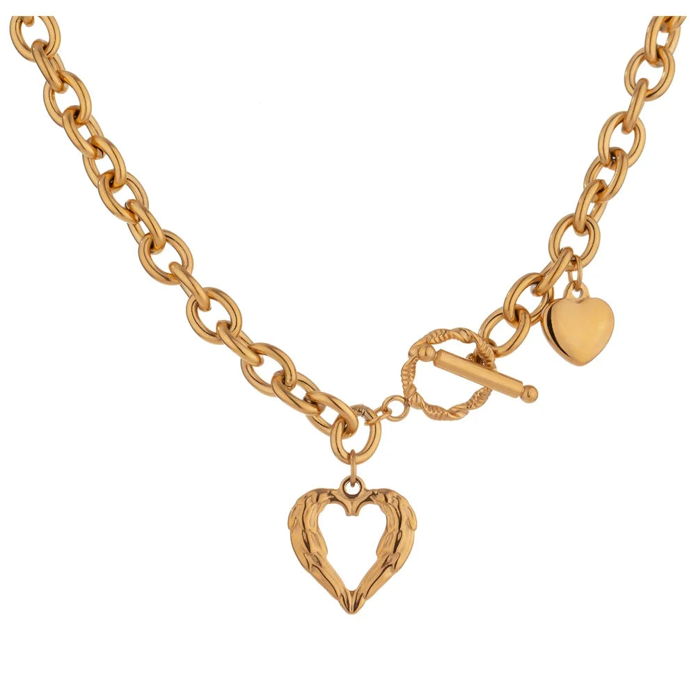 Gold-plated stainless steel necklace featuring a heart pendant with a small chain.