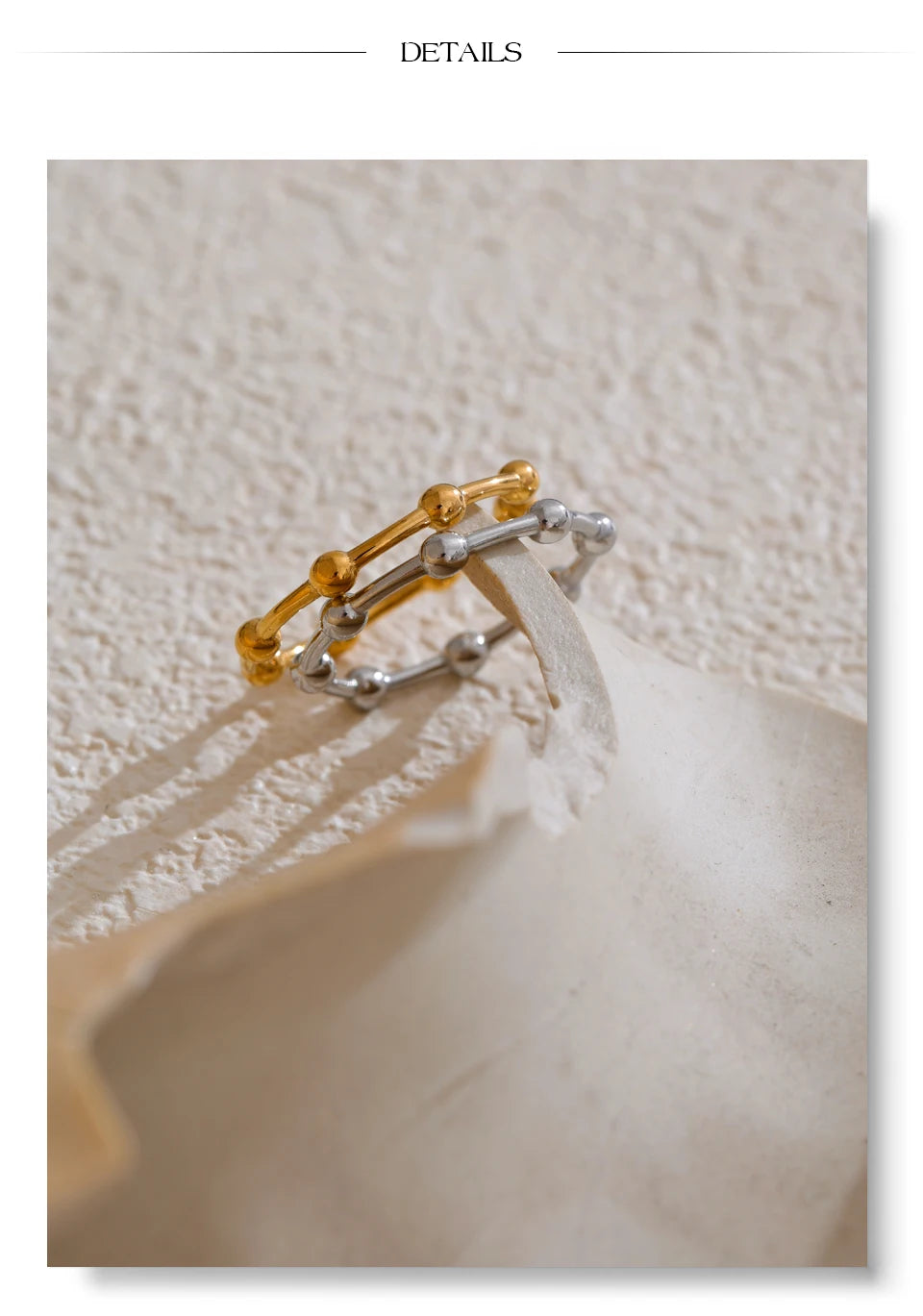 Beaded minimalist geometric ring in 18K gold-plated stainless steel.