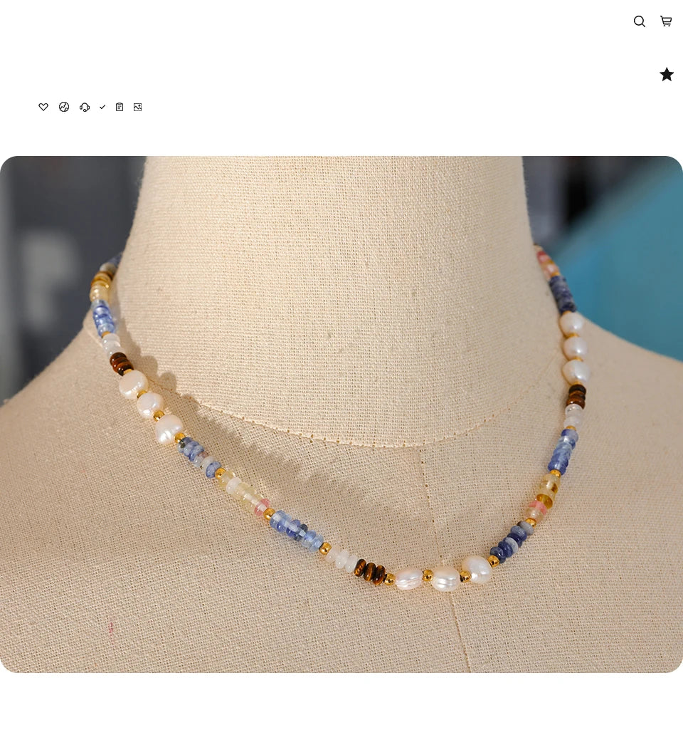 Freshwater pearl natural stone beaded necklace in gold-plated stainless steel with freshwater pearl and natural stone.