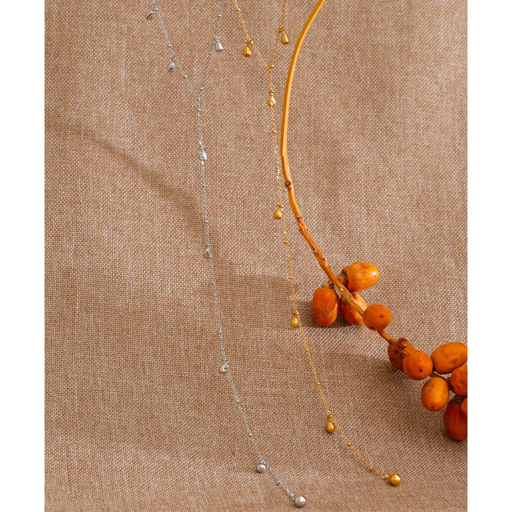 Geometric chain necklace in gold-plated stainless steel.