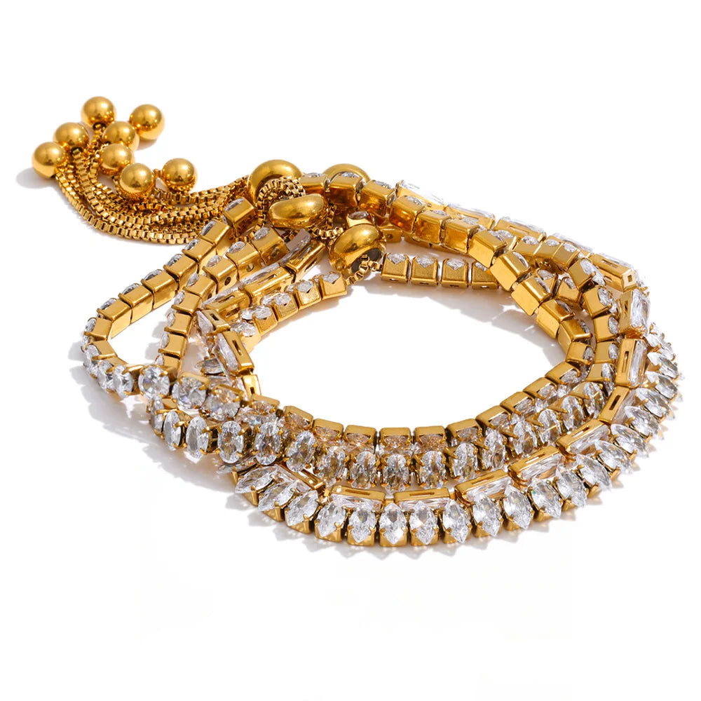Gold-plated bracelet with cubic zirconia stones.