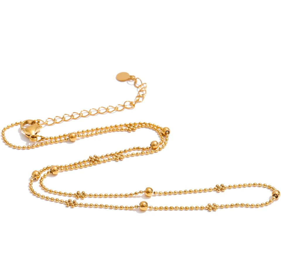 Geometric chain necklace in gold-plated stainless steel.