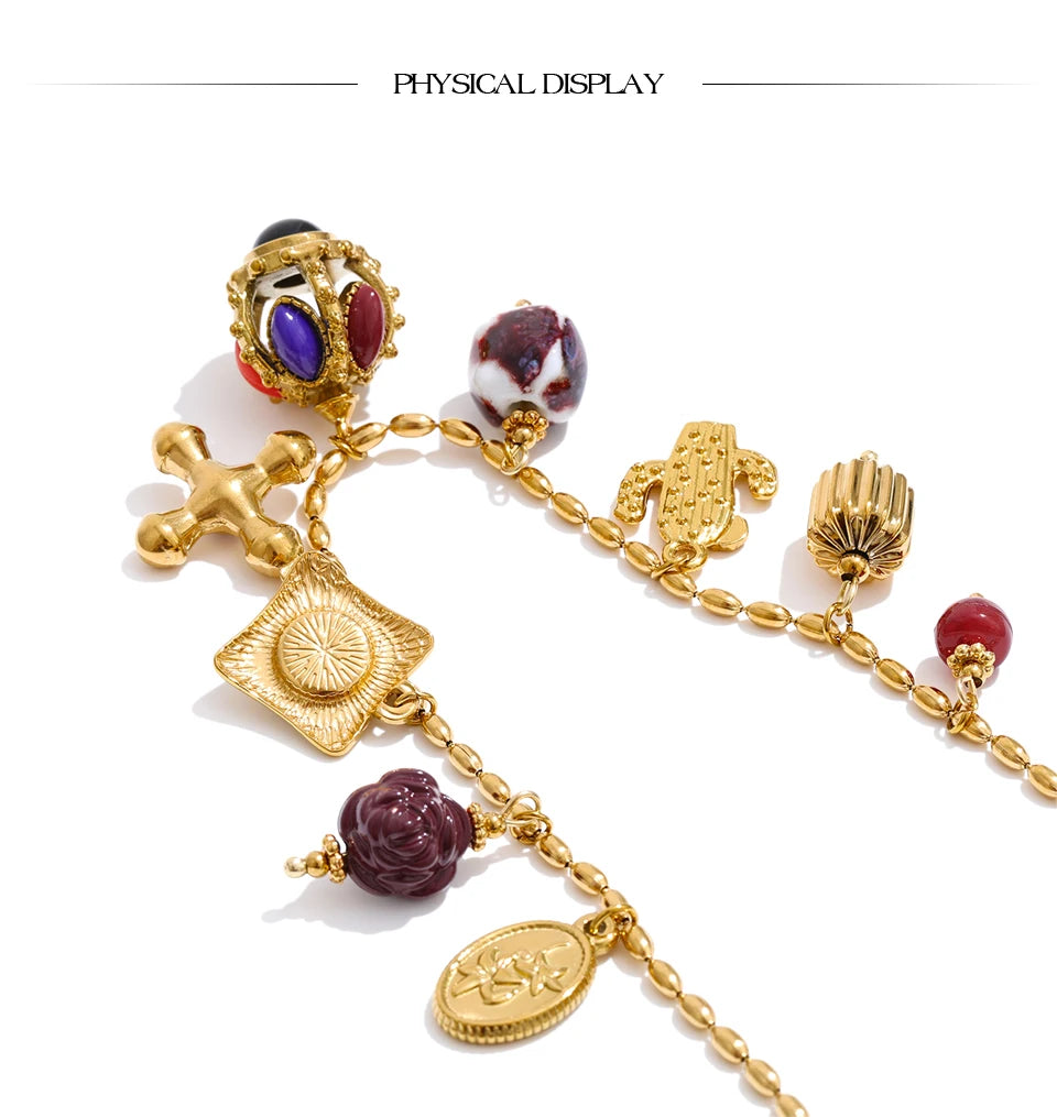 Resin acrylic cross necklace in gold-plated stainless steel with resin and acrylic.