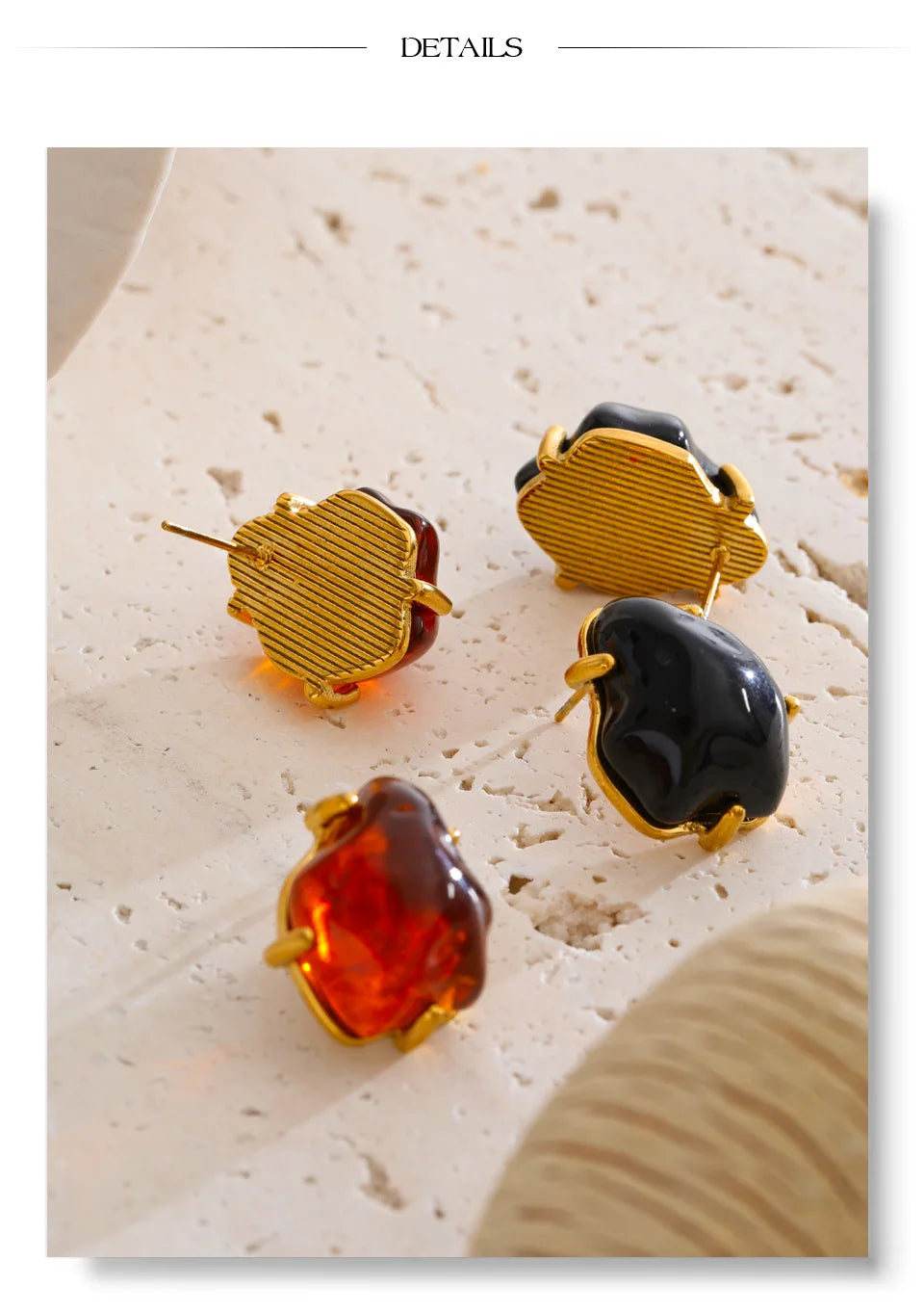Black resin acrylic earrings in gold-plated stainless steel with resin and acrylic.