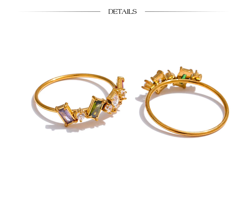 Cubic zirconia multi-color geometric ring in 18K gold-plated stainless steel with cubic zirconia.