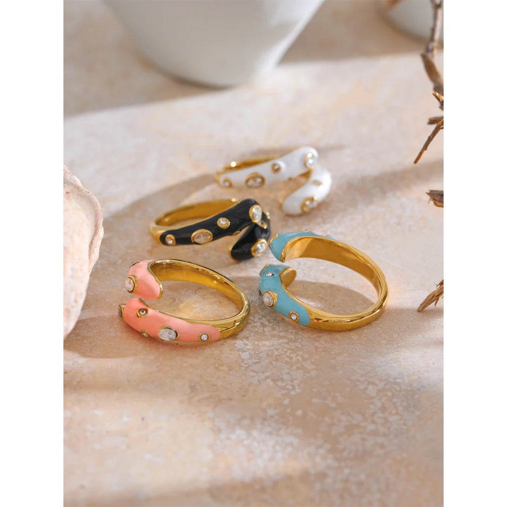 Black cubic zirconia enamel ring in 18K gold-plated stainless steel with cubic zirconia and enamel.