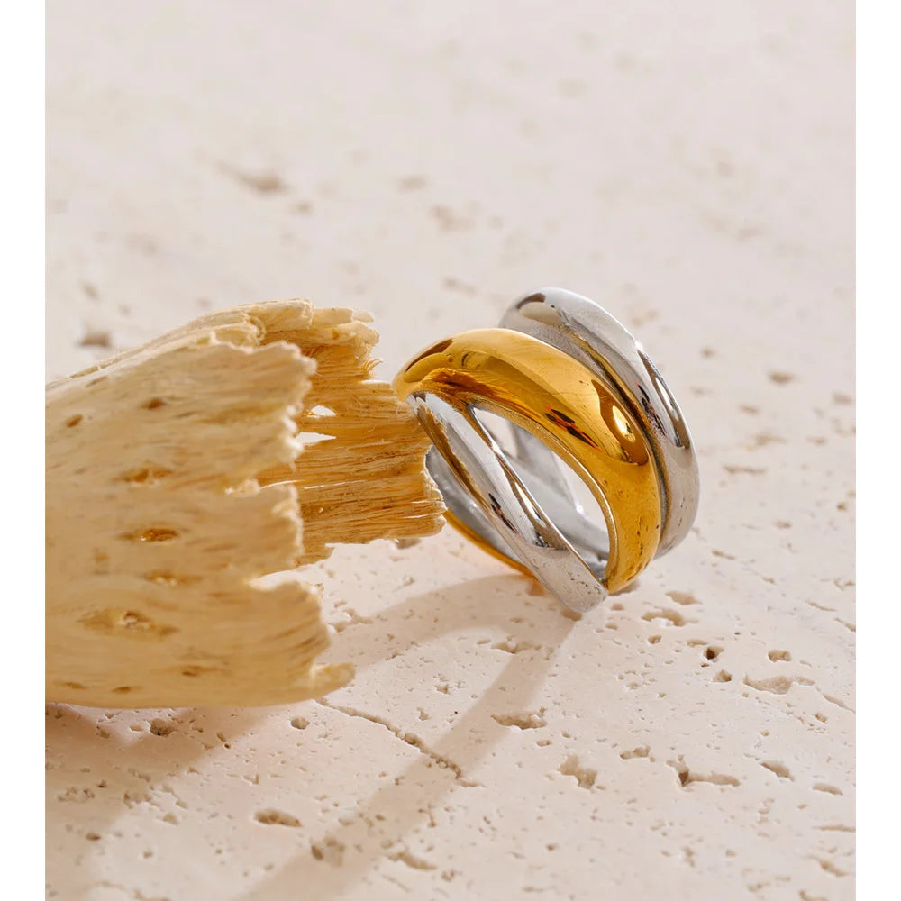 Geometric layered ring in 18K gold-plated stainless steel.