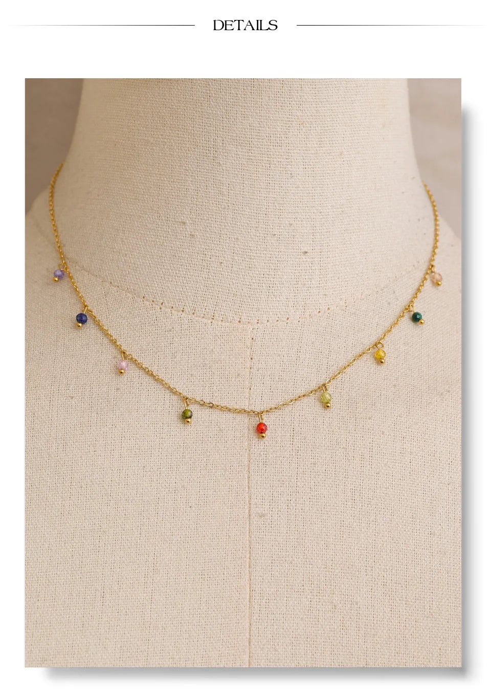 Cubic zirconia multi-color geometric necklace in gold-plated stainless steel with cubic zirconia.