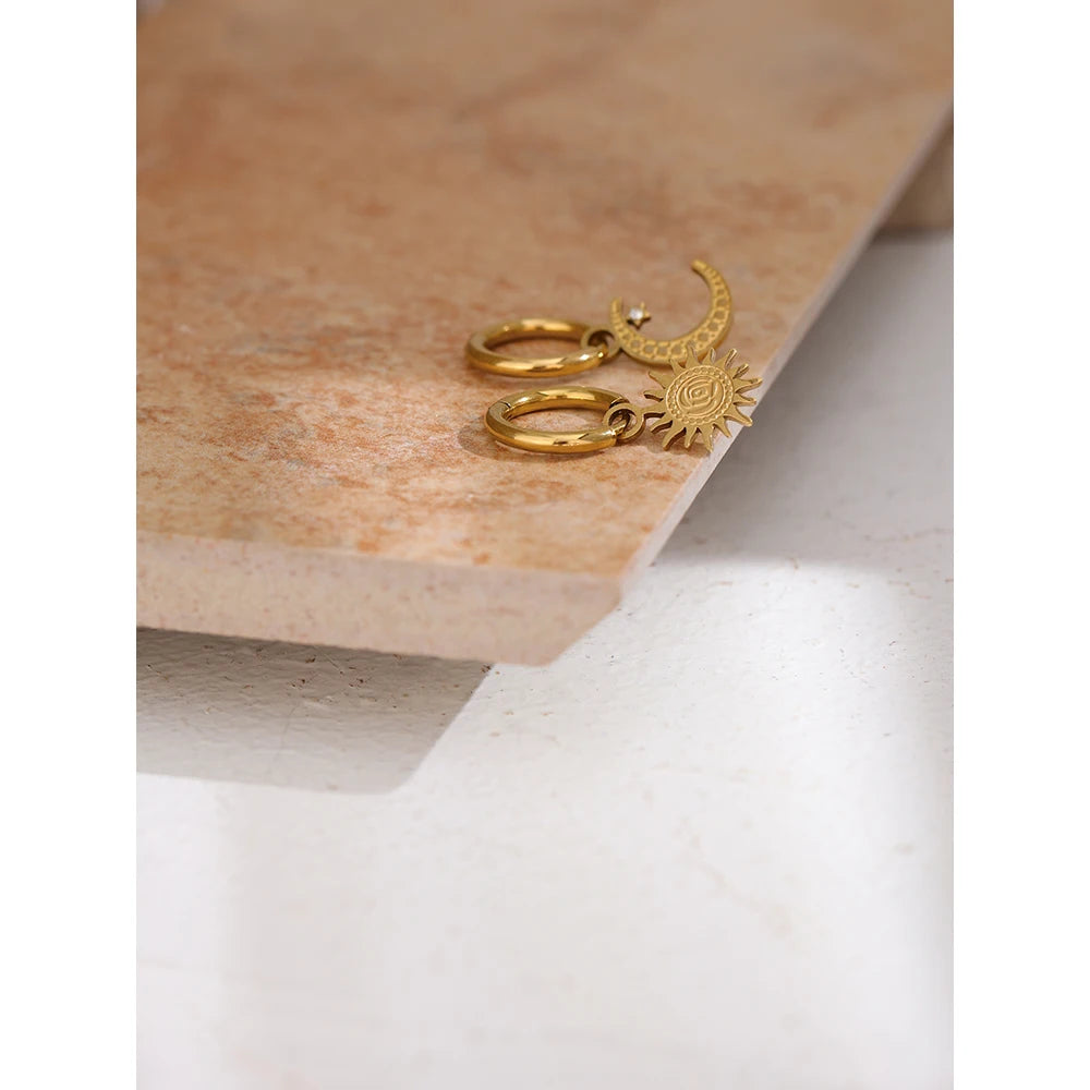Star moon hammered earrings in gold-plated stainless steel.