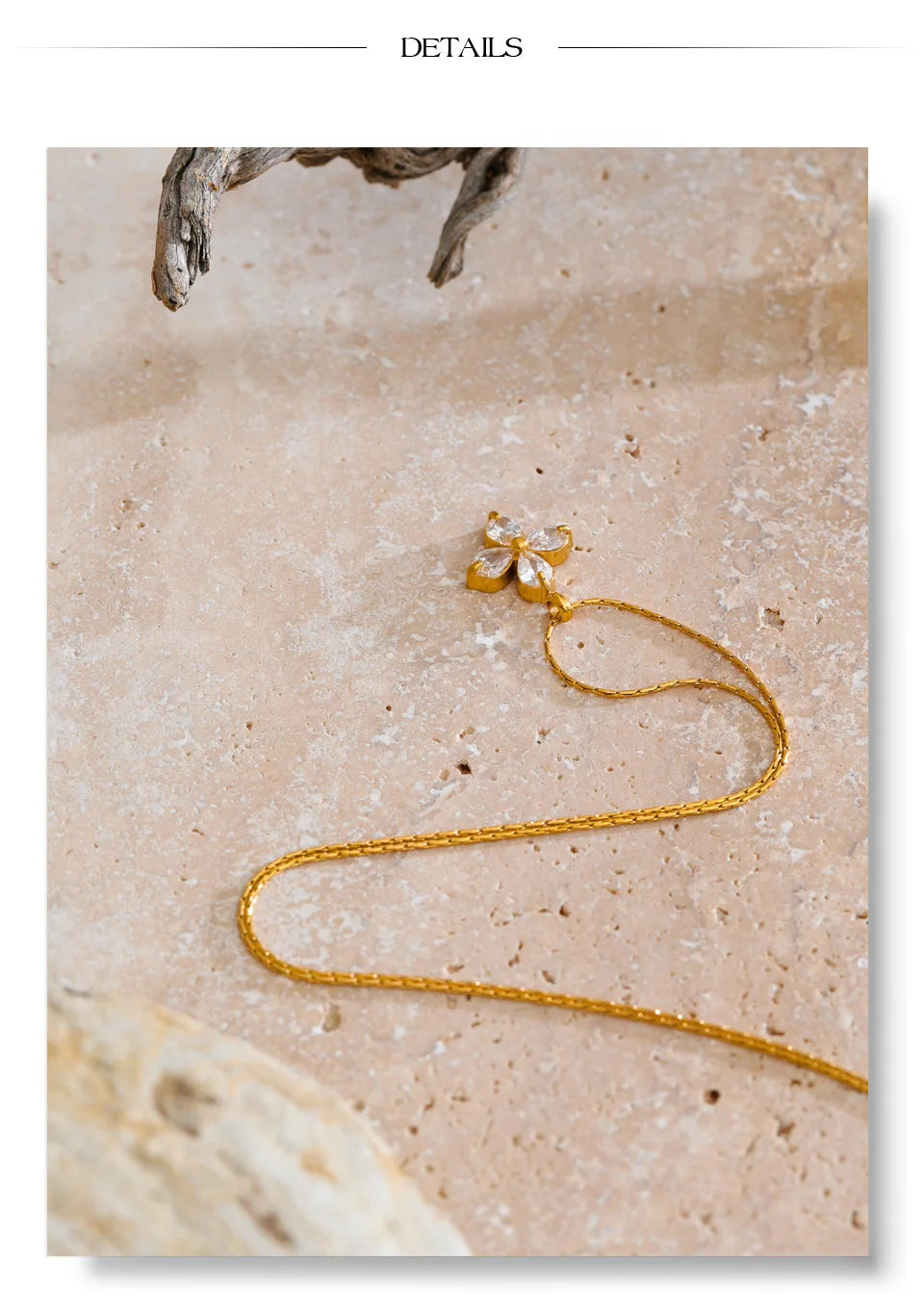 Cubic zirconia flower necklace in gold-plated stainless steel with cubic zirconia.
