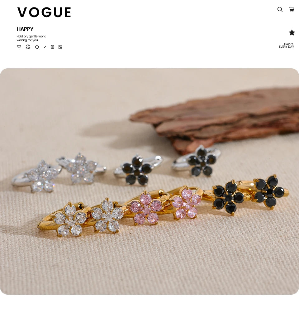 Cubic zirconia flower earrings in gold-plated stainless steel with cubic zirconia.