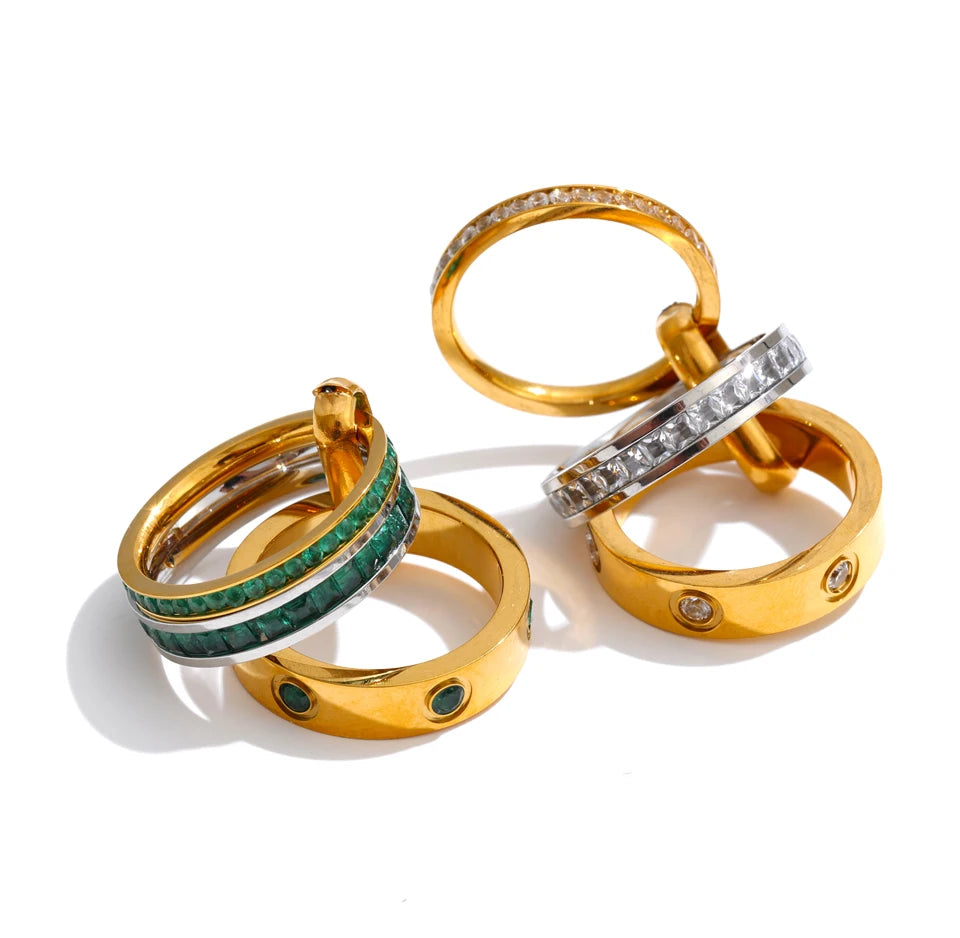 White cubic zirconia geometric ring in 18K gold-plated stainless steel with cubic zirconia.