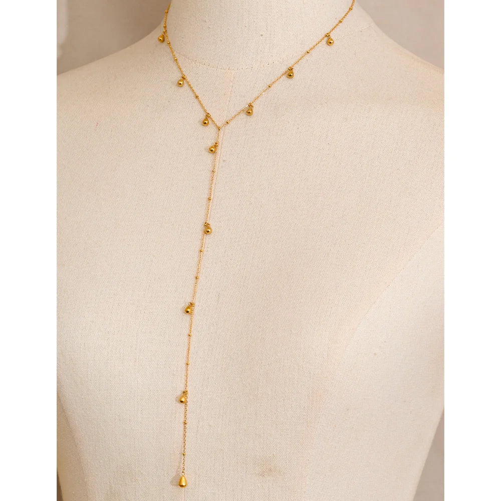 Geometric chain necklace in gold-plated stainless steel.