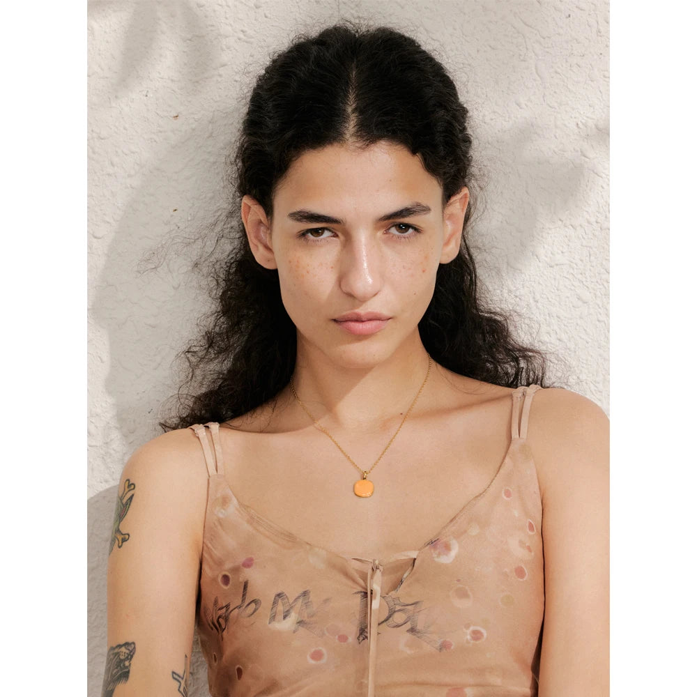 Geometric necklace in gold-plated stainless steel.