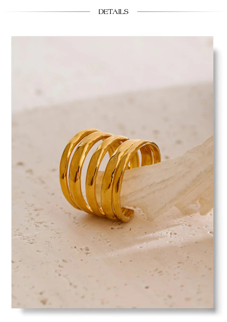 Geometric layered ring in 18K gold-plated stainless steel.