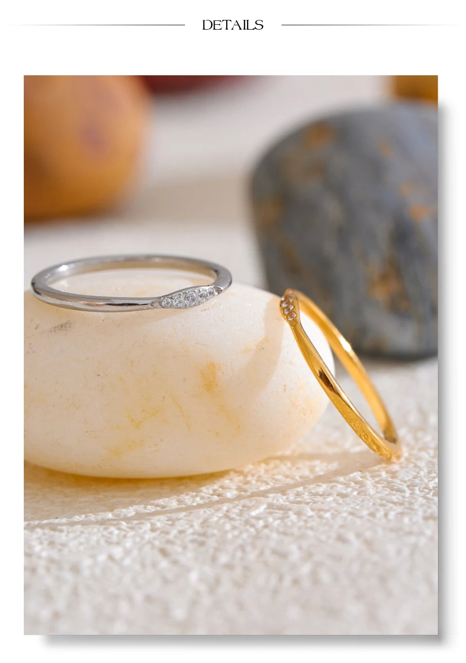 Cubic zirconia geometric ring in 18K gold-plated stainless steel with cubic zirconia.