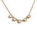 Cubic zirconia geometric necklace in gold-plated stainless steel with cubic zirconia.