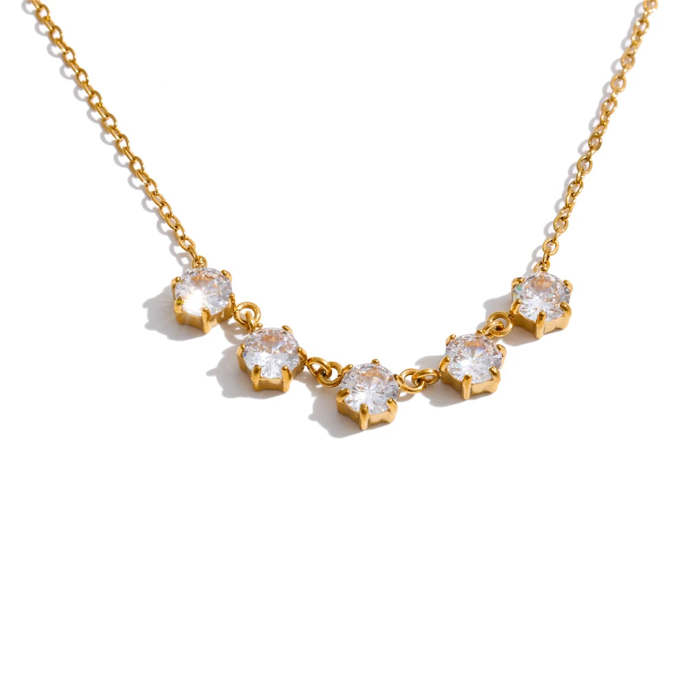 Cubic zirconia geometric necklace in gold-plated stainless steel with cubic zirconia.