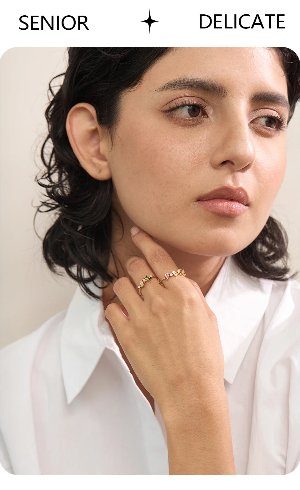 Cubic zirconia multi-color geometric ring in 18K gold-plated stainless steel with cubic zirconia.