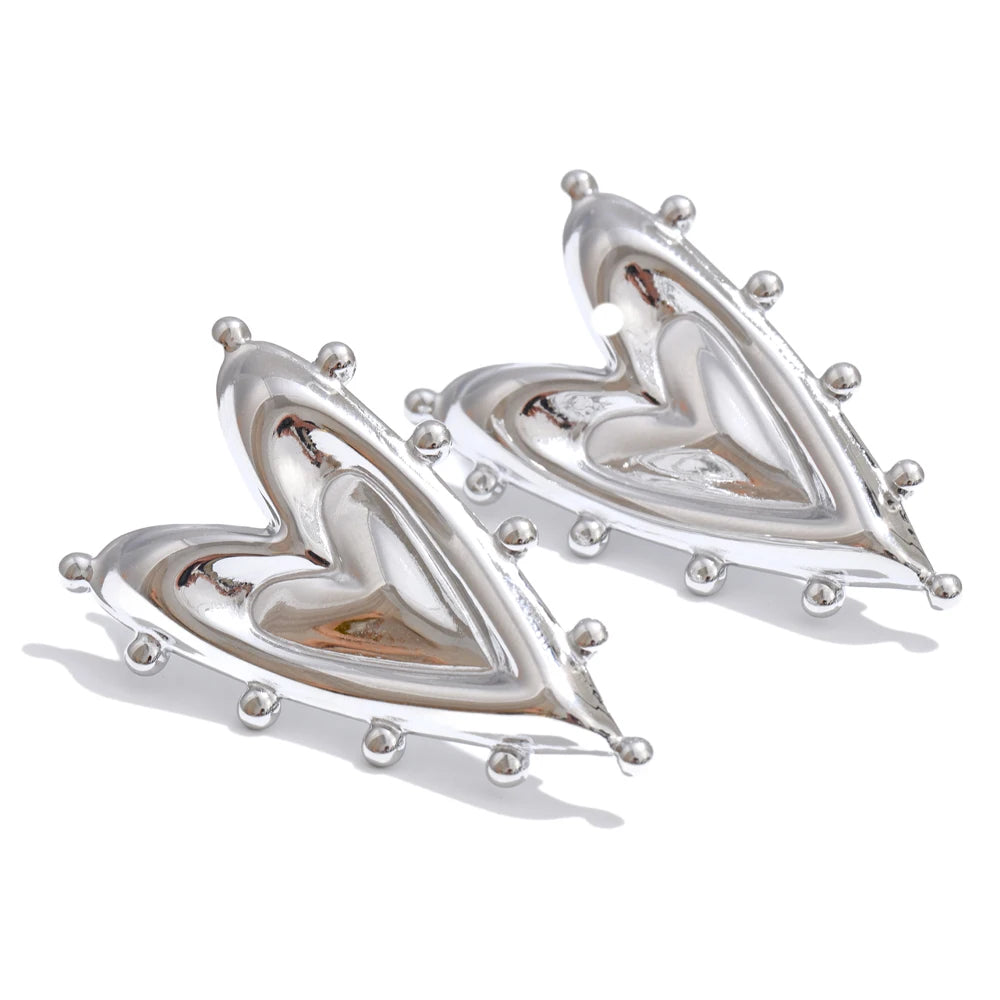Heart earrings in gold-plated stainless steel.