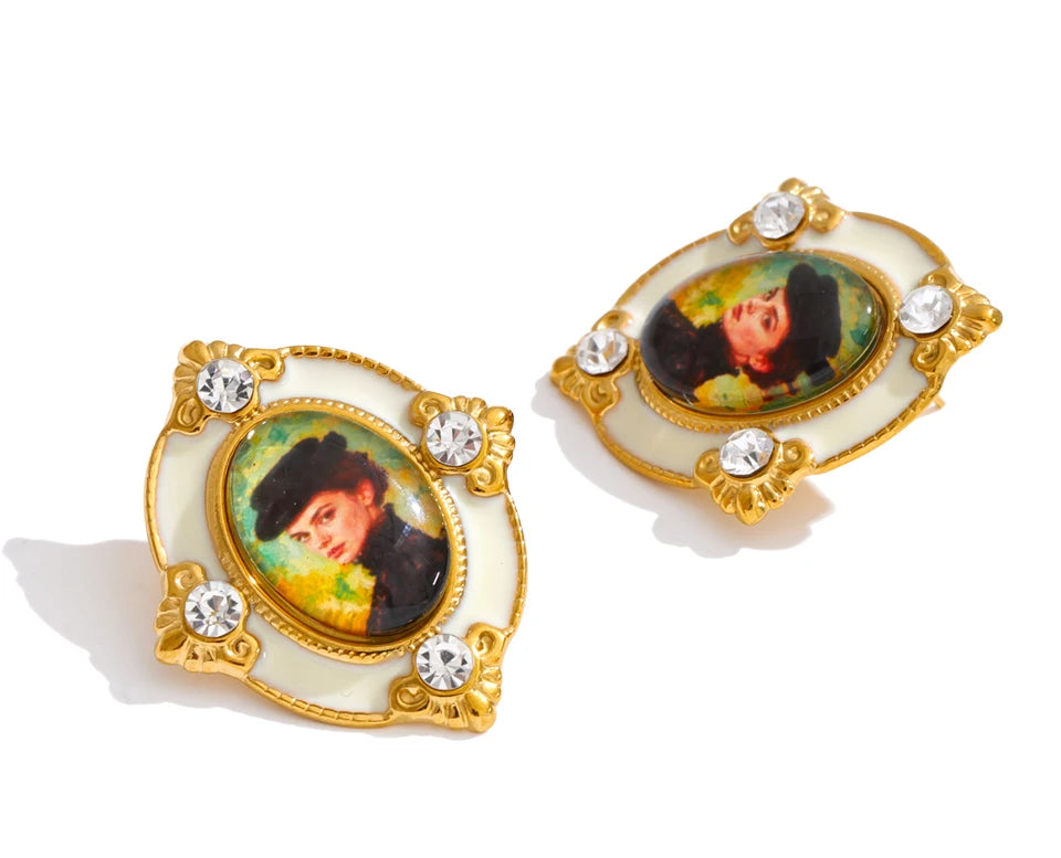 Resin crystal geometric earrings in gold-plated stainless steel with resin and crystal.