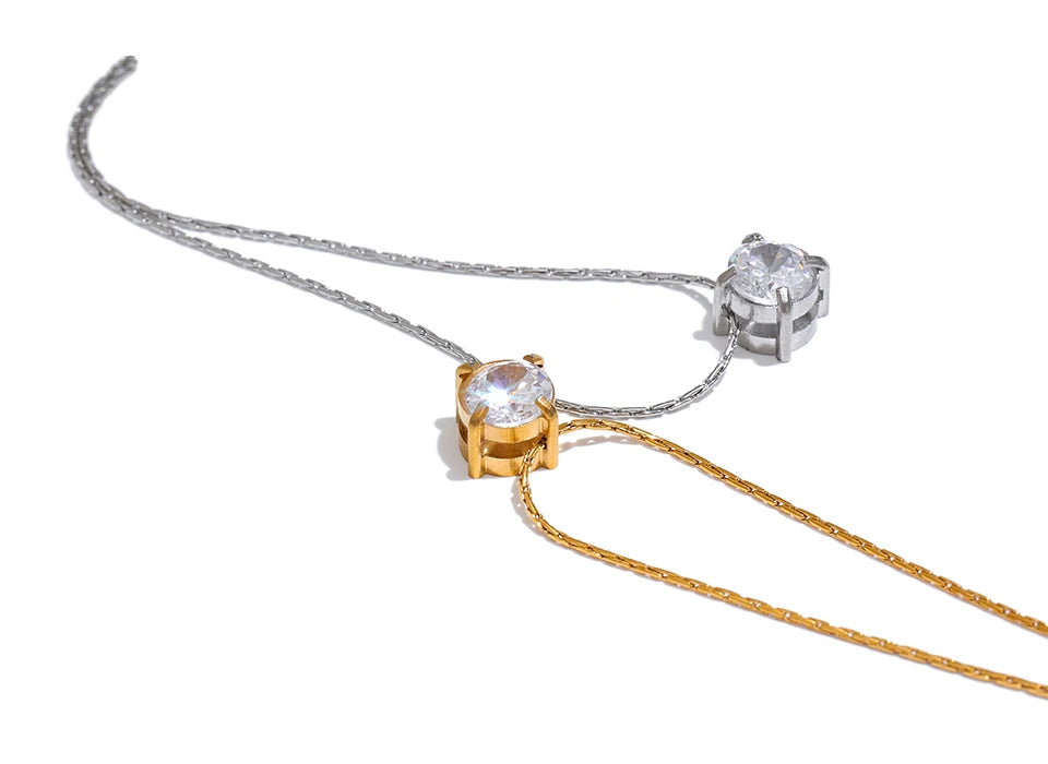Cubic zirconia geometric necklace in gold-plated stainless steel with cubic zirconia.
