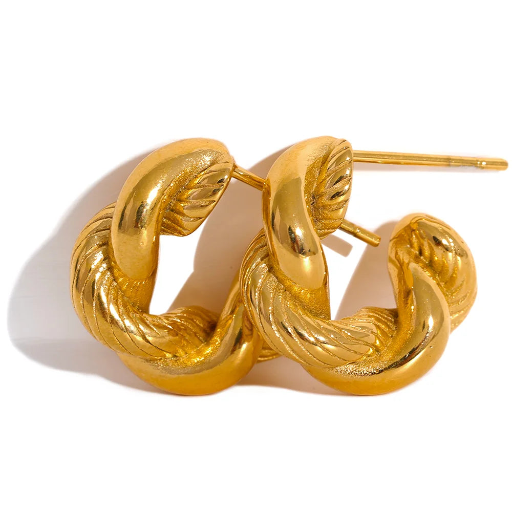 Geometric earrings in gold-plated 316L stainless steel.