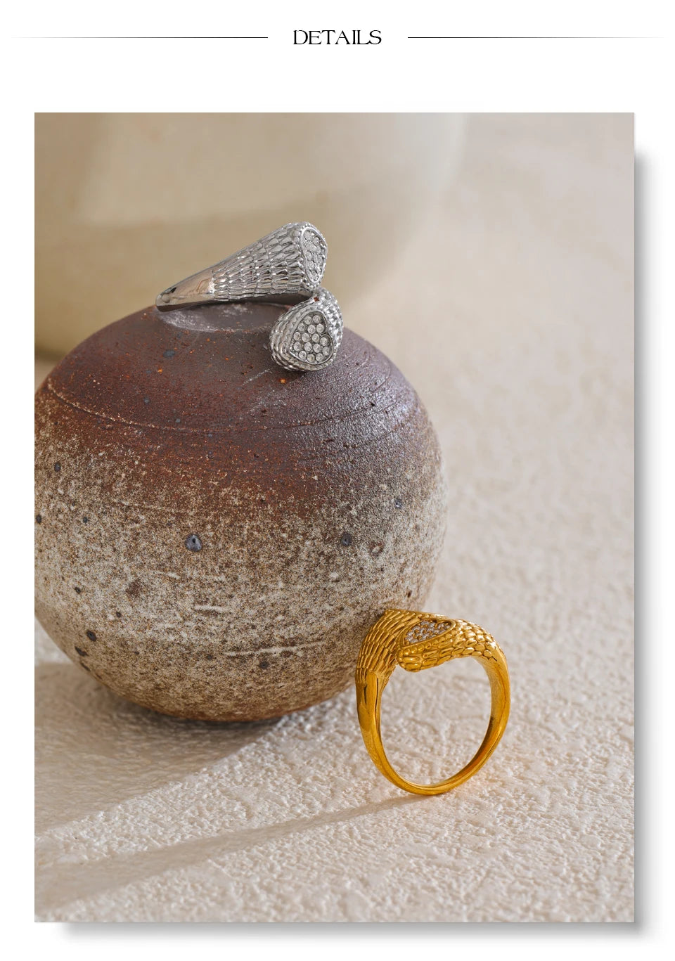 Cubic zirconia heart snake ring in gold-plated stainless steel with cubic zirconia.