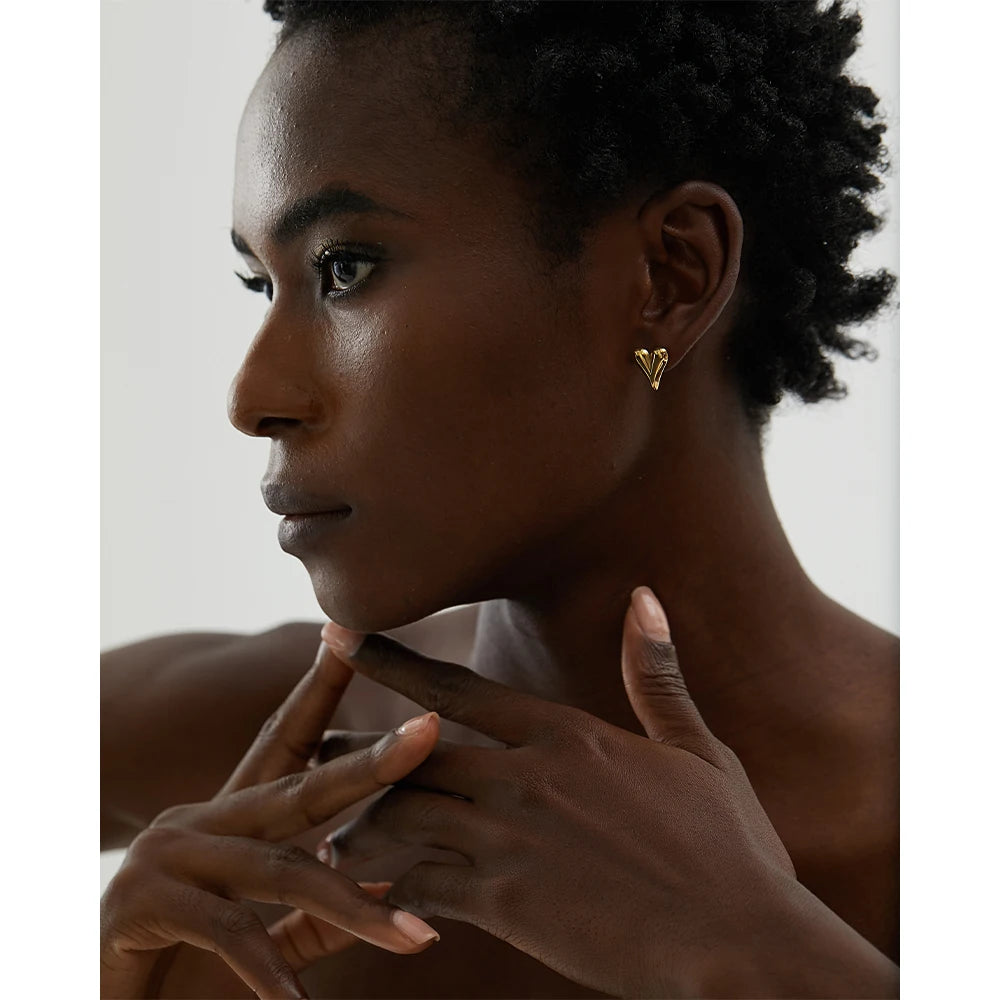 Heart earrings in gold-plated stainless steel.
