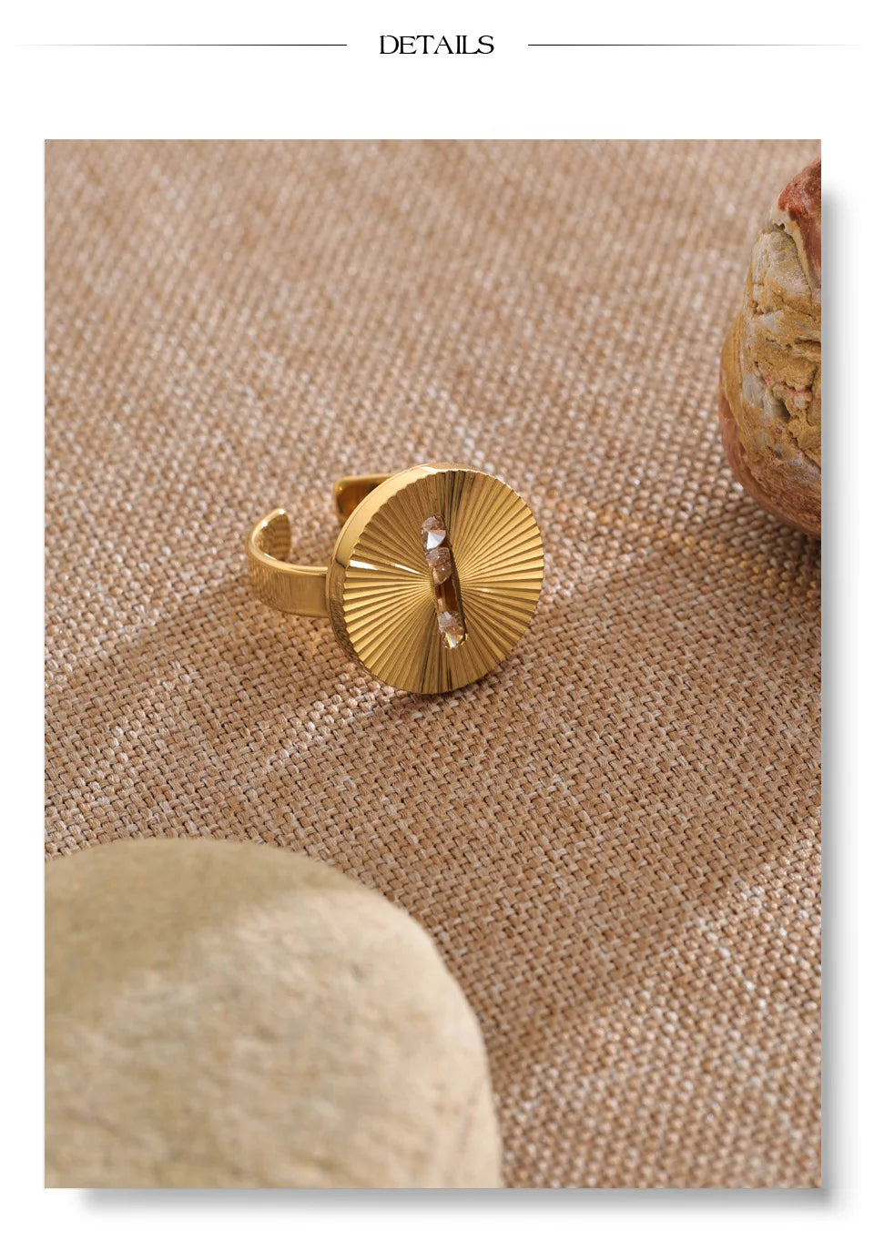 Cubic zirconia geometric ring in 18K gold-plated stainless steel with cubic zirconia.