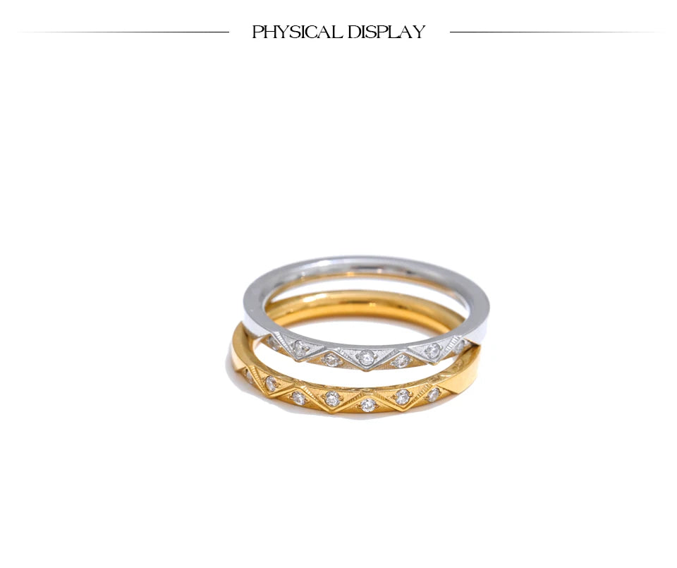 Cubic zirconia geometric ring in gold-plated stainless steel with cubic zirconia.