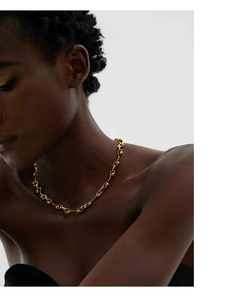 Geometric chain necklace in 18K gold-plated stainless steel.