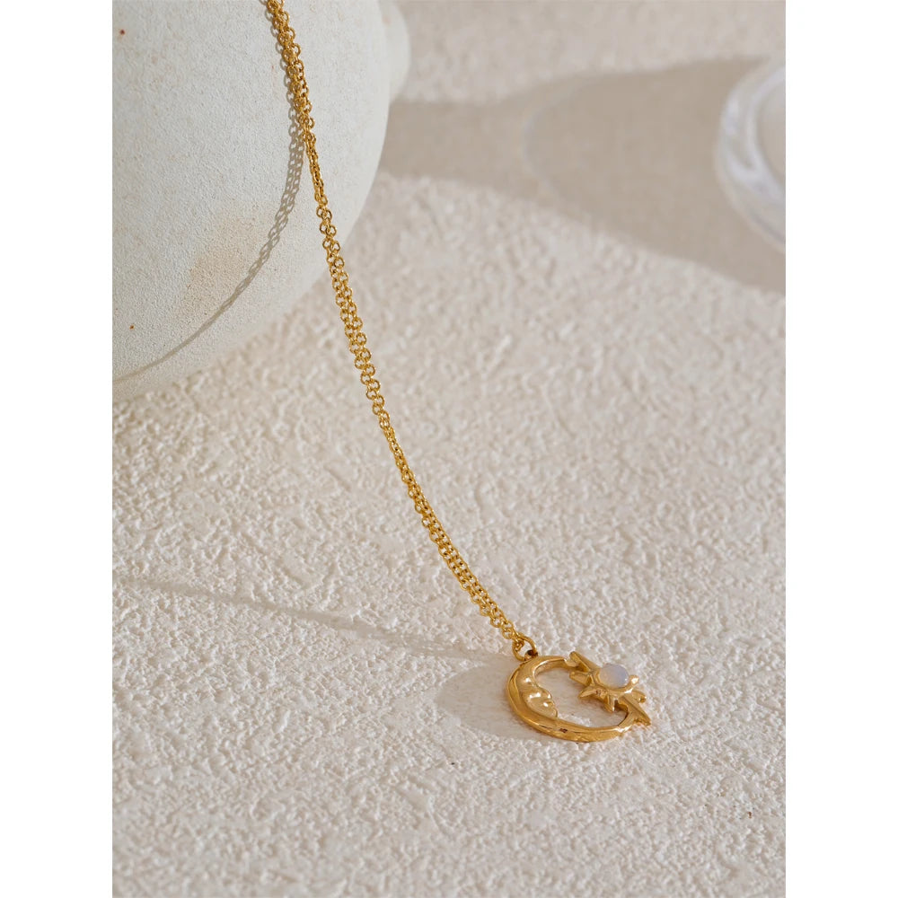 Star moon necklace in gold-plated stainless steel.