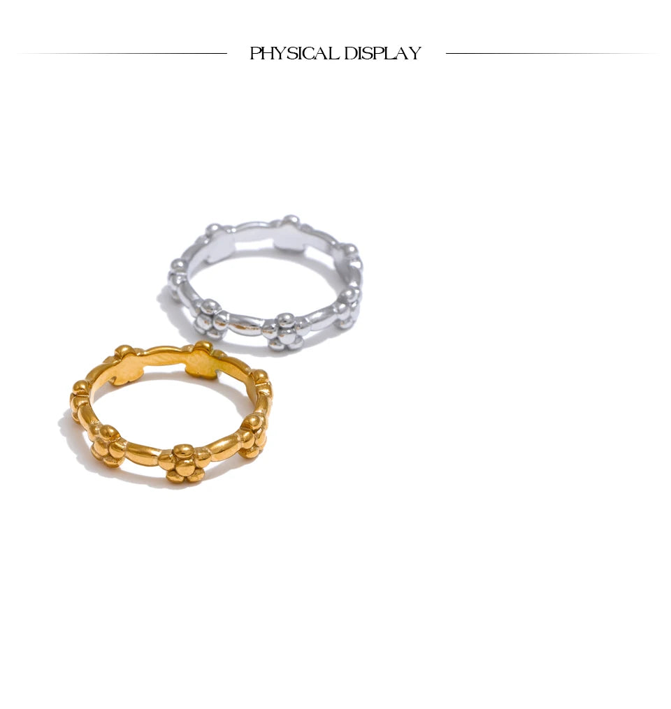 Flower ring in 18K gold-plated stainless steel.