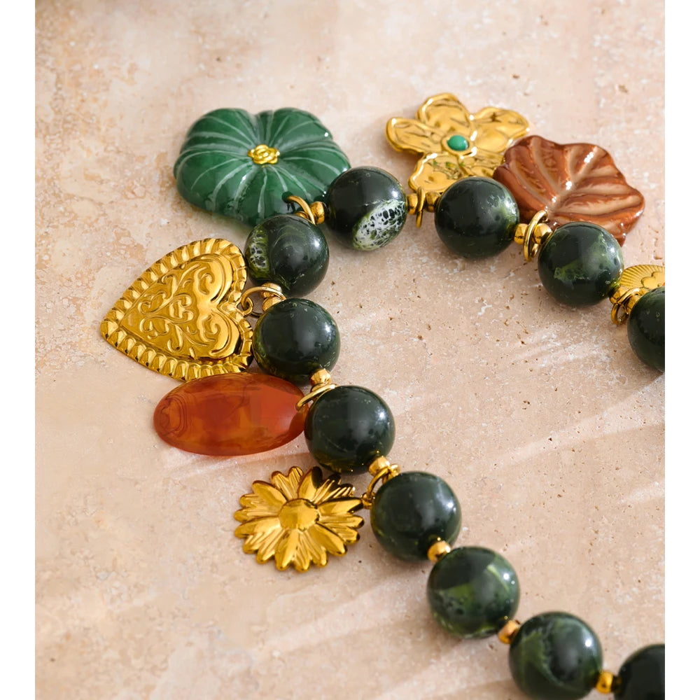 Green resin acrylic necklace in gold-plated stainless steel with resin and acrylic.
