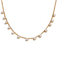Cubic zirconia geometric necklace in gold-plated stainless steel with cubic zirconia.