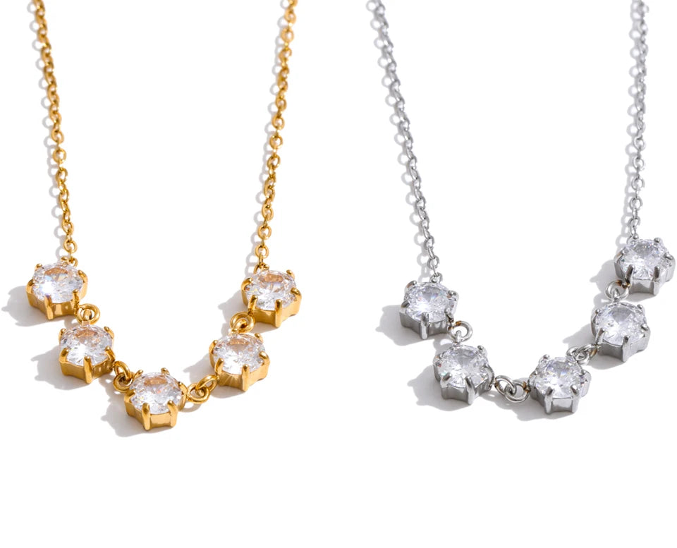 Cubic zirconia geometric necklace in gold-plated stainless steel with cubic zirconia.