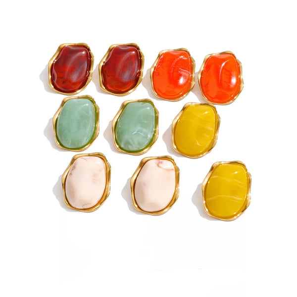 Gold-plated stainless steel earrings with resin and acrylic.