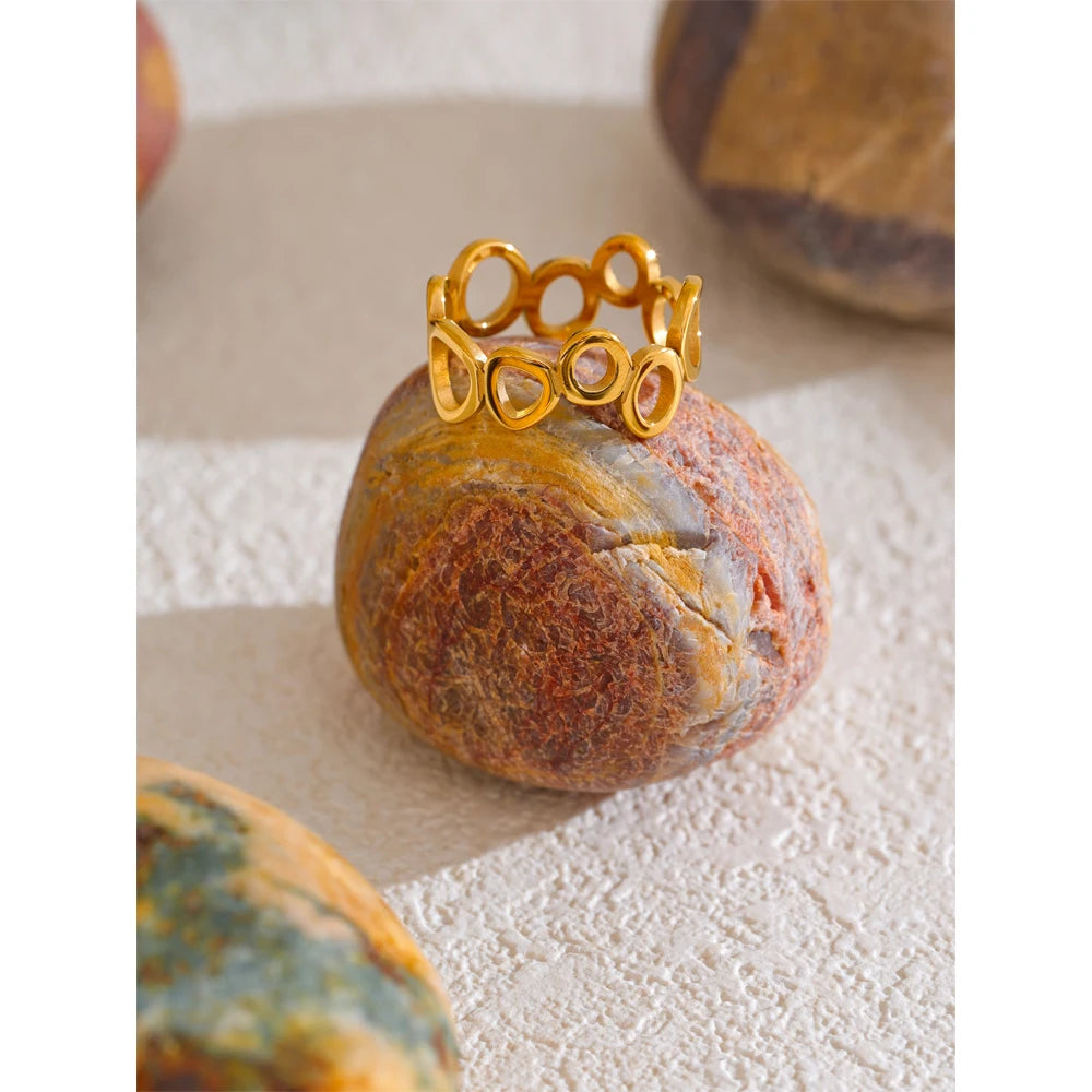 Geometric ring in 18K gold-plated stainless steel.