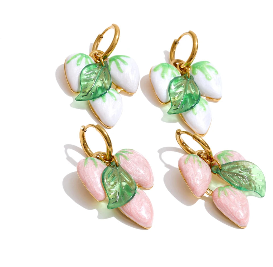 White geometric earrings in gold-plated stainless steel.