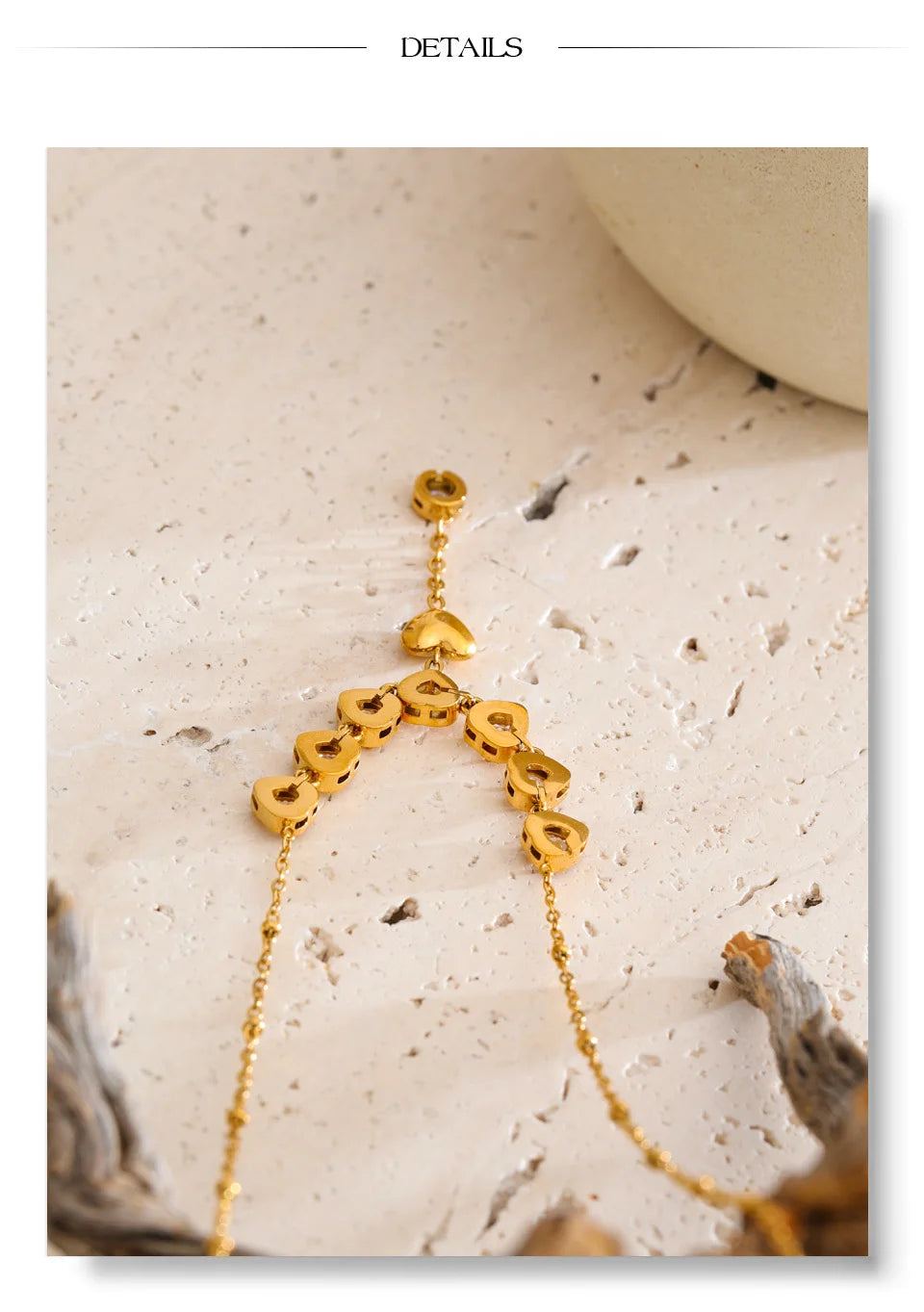 Cubic zirconia heart necklace in gold-plated stainless steel with cubic zirconia.