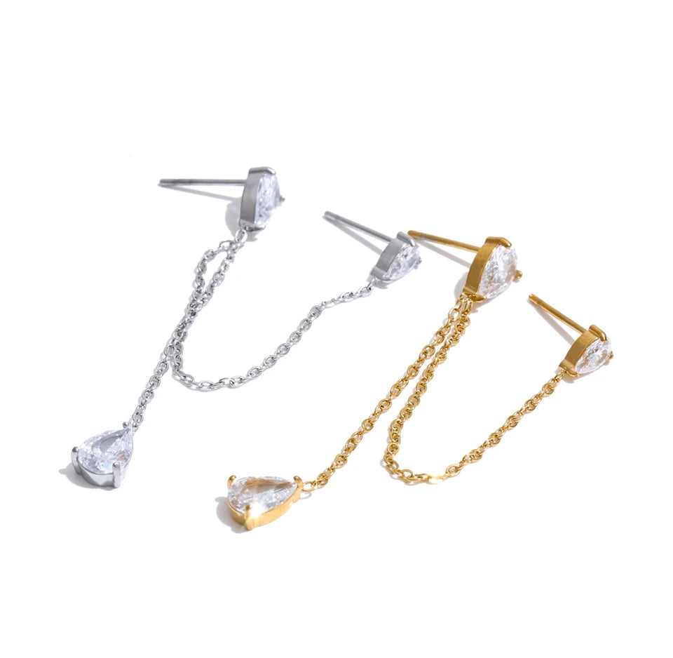 Cubic zirconia chain earrings in gold-plated stainless steel with cubic zirconia.