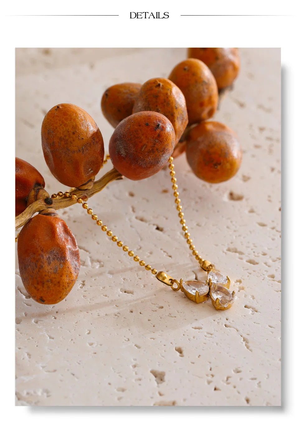 Cubic zirconia geometric necklace in gold-plated stainless steel with cubic zirconia.